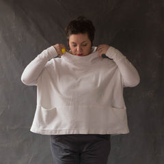 Female wearing the Julia Pocket Top sewing pattern showing the Neckline detail